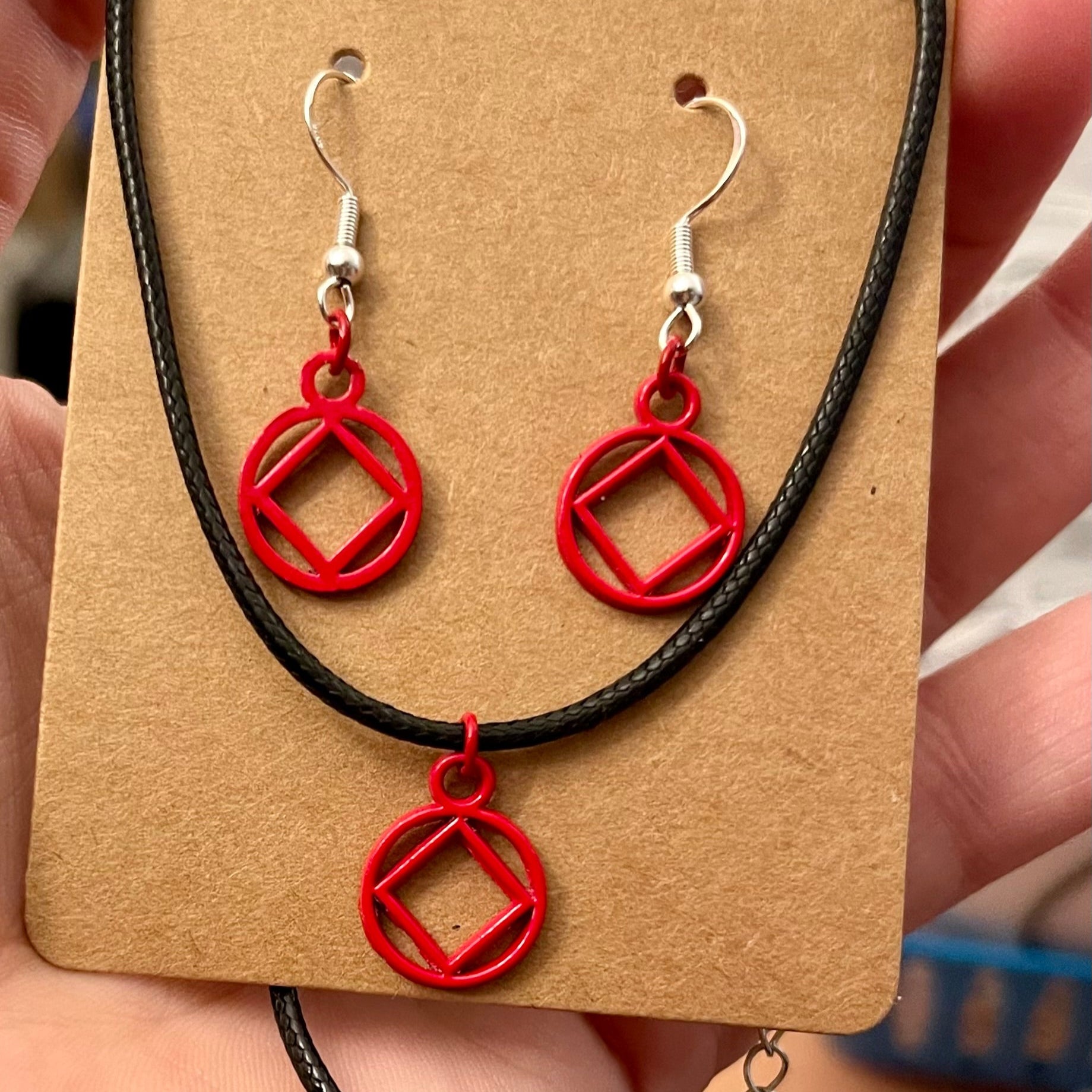 Red Coated NA Charm necklace