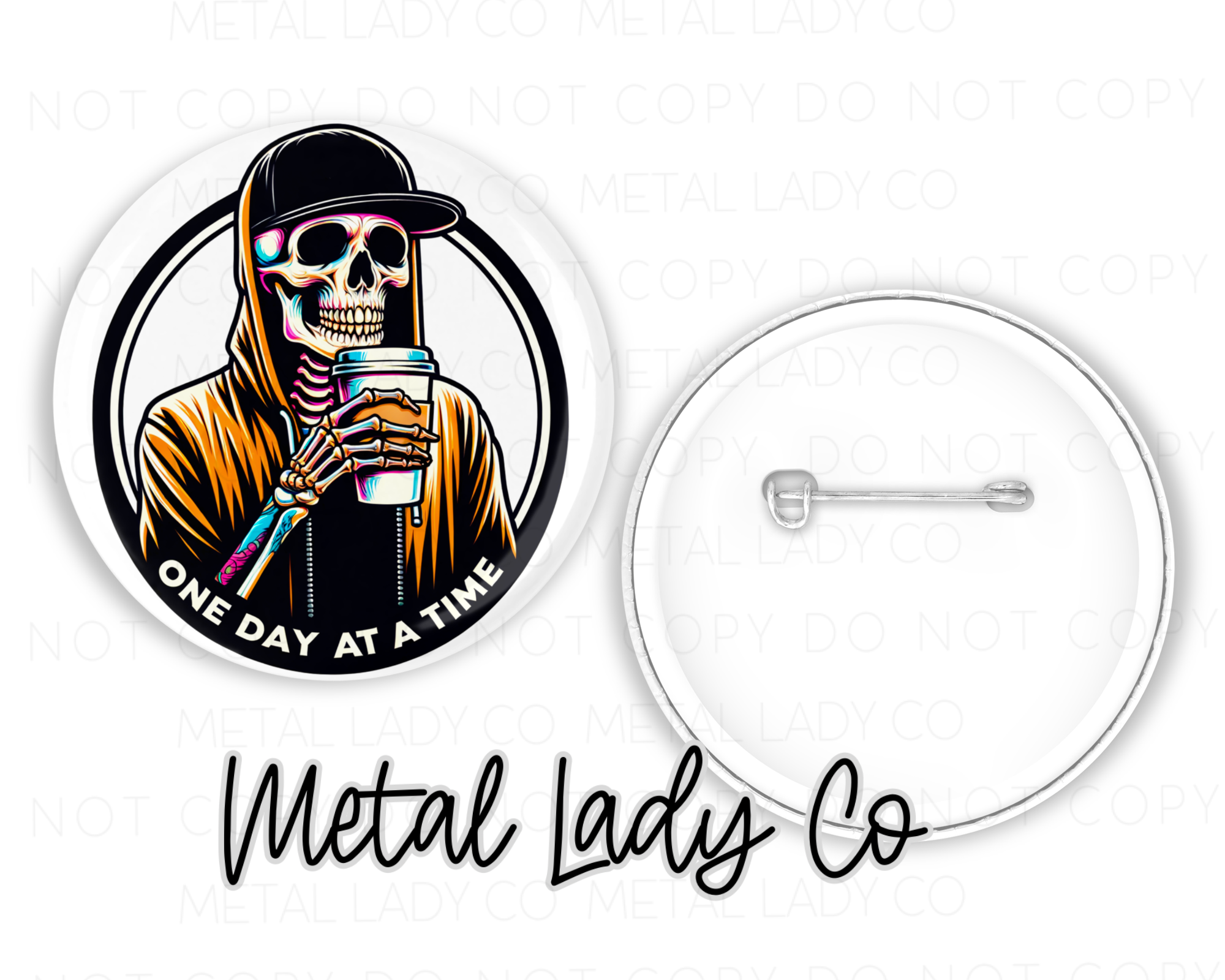 A 2-inch pin with a graphic of a skeleton drinking coffee, accompanied by the text 'One Day At A Time' and the brand 'Metal Lady Co'.