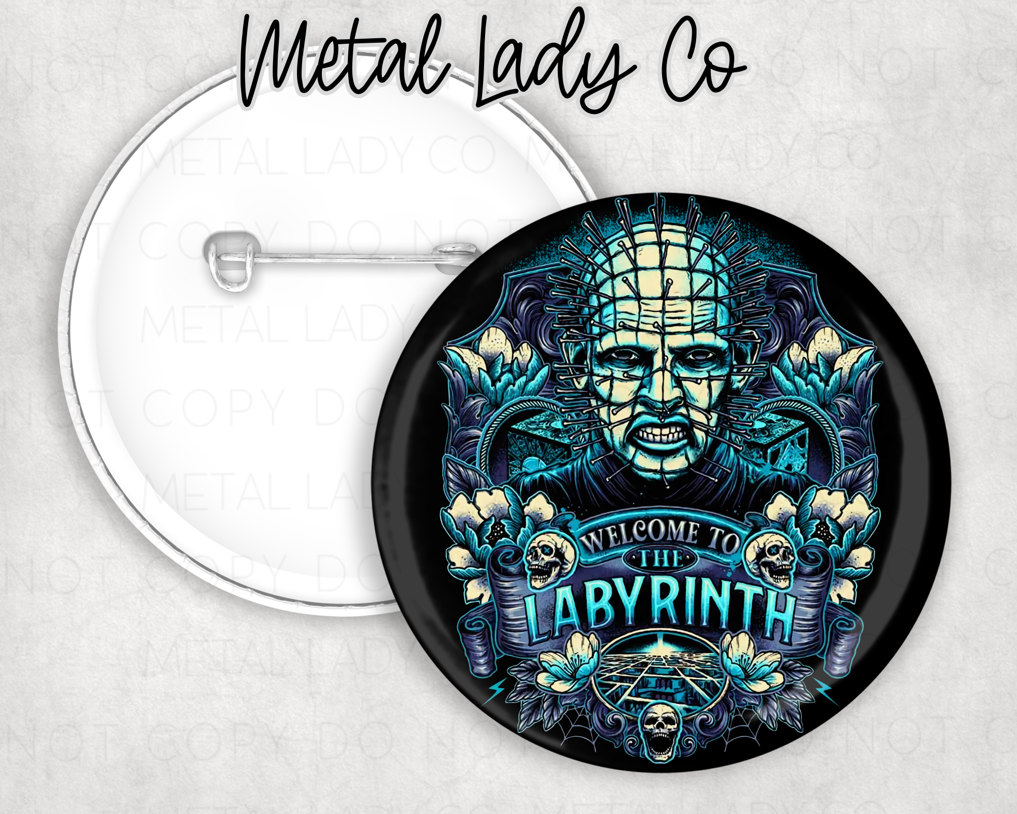 A round pinback button with an illustration of a character resembling Pinhead from a horror genre, with a stylized background and text that reads 'METAL LADY CO' and 'THE LABYRINTH'.