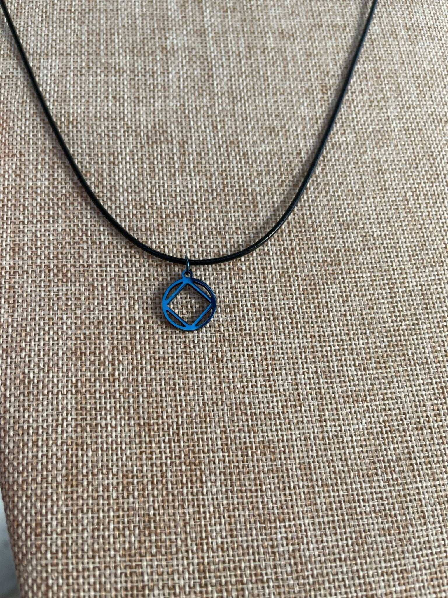 Blue Stainless Steel Narcotics Anonymous Symbol Necklace.