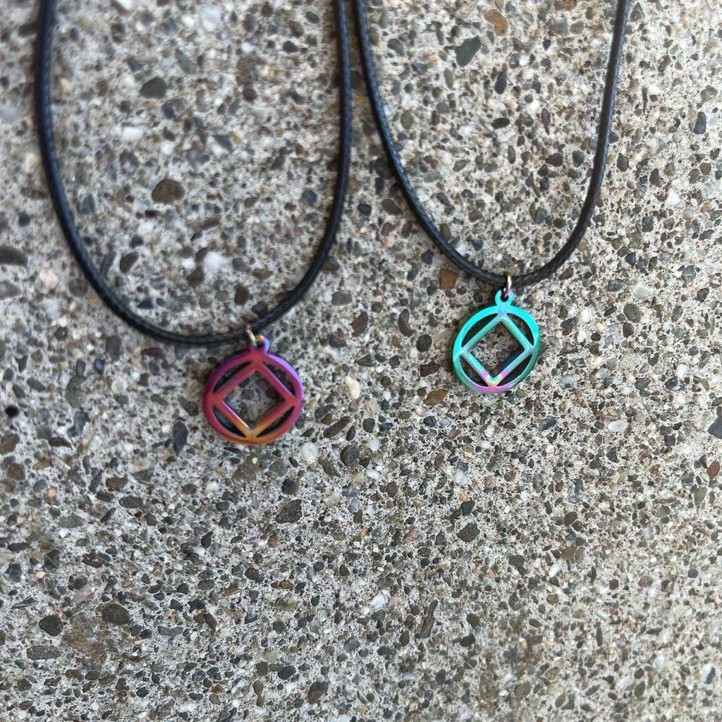 MetalLadyCo NA Charm Necklace featuring two colorful geometric pendants on black cords