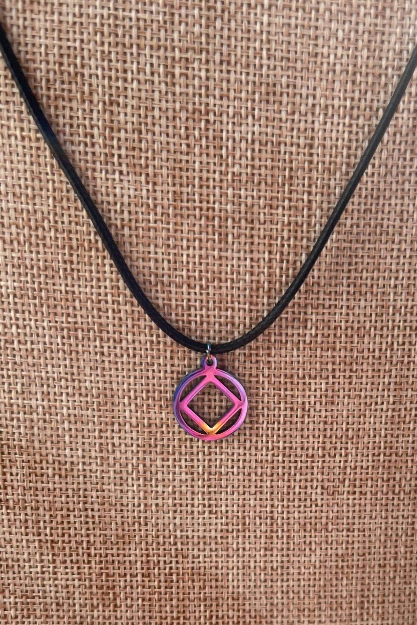 MetalLadyCo NA Charm Necklace with purple and pink geometric pendant on black cord
