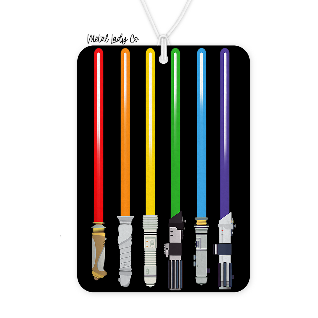 Colorful lightsabers on a black background with 'Metal Lady Co' branding.