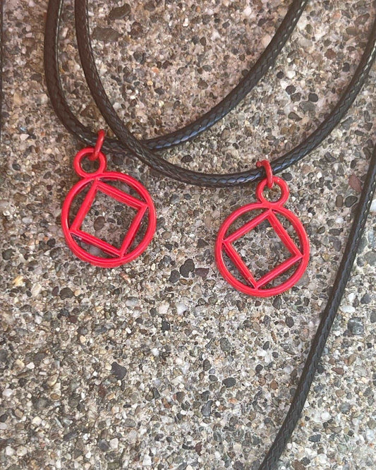 Red Coated Stainless Steel NA symbol necklace