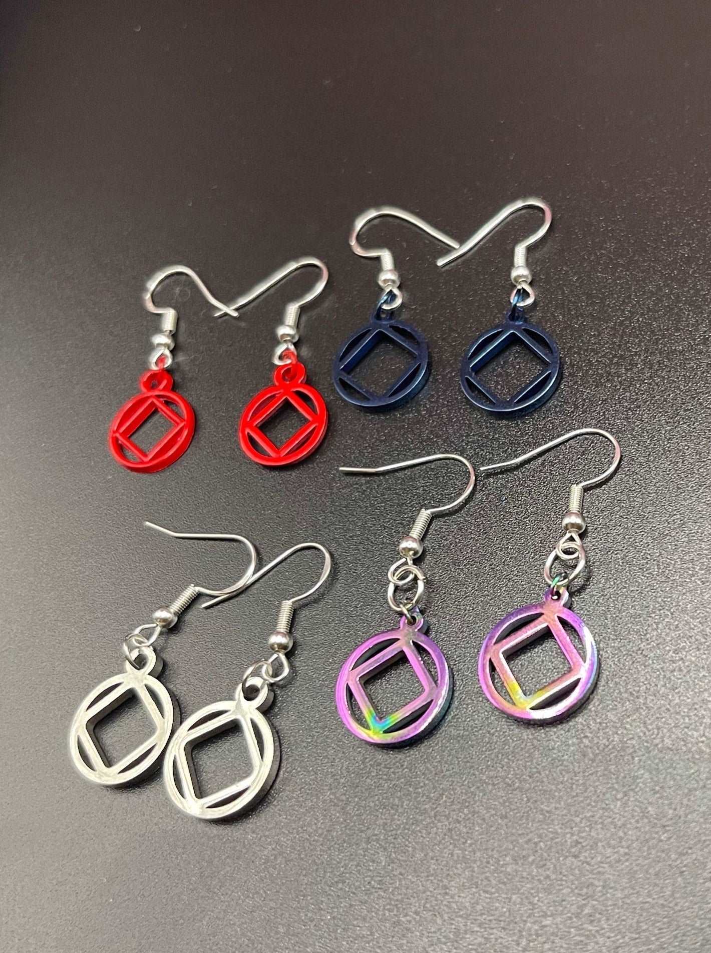 Stainless Steel NA symbol earrings