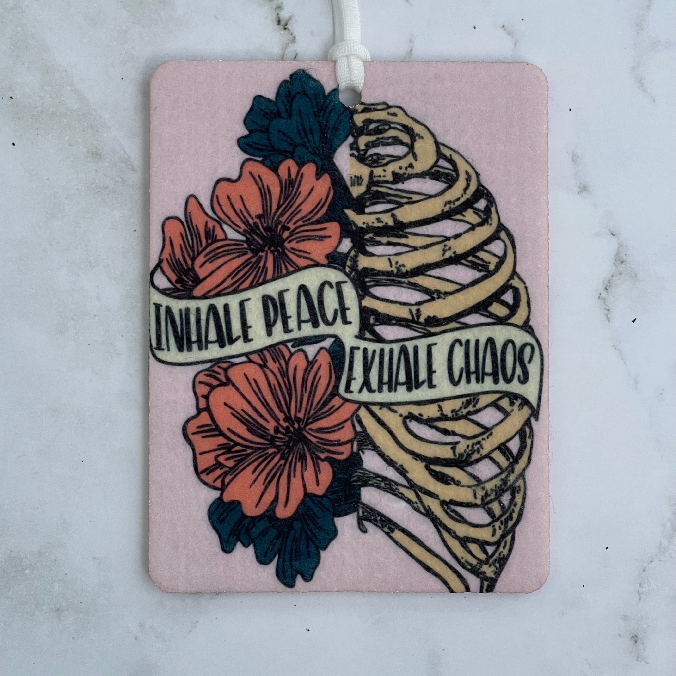 Air Freshener with Inhale Peace, Exhale Chaos in bone ribcage and floral image