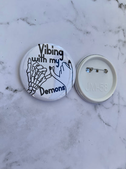 Vibing with my demons pinback button